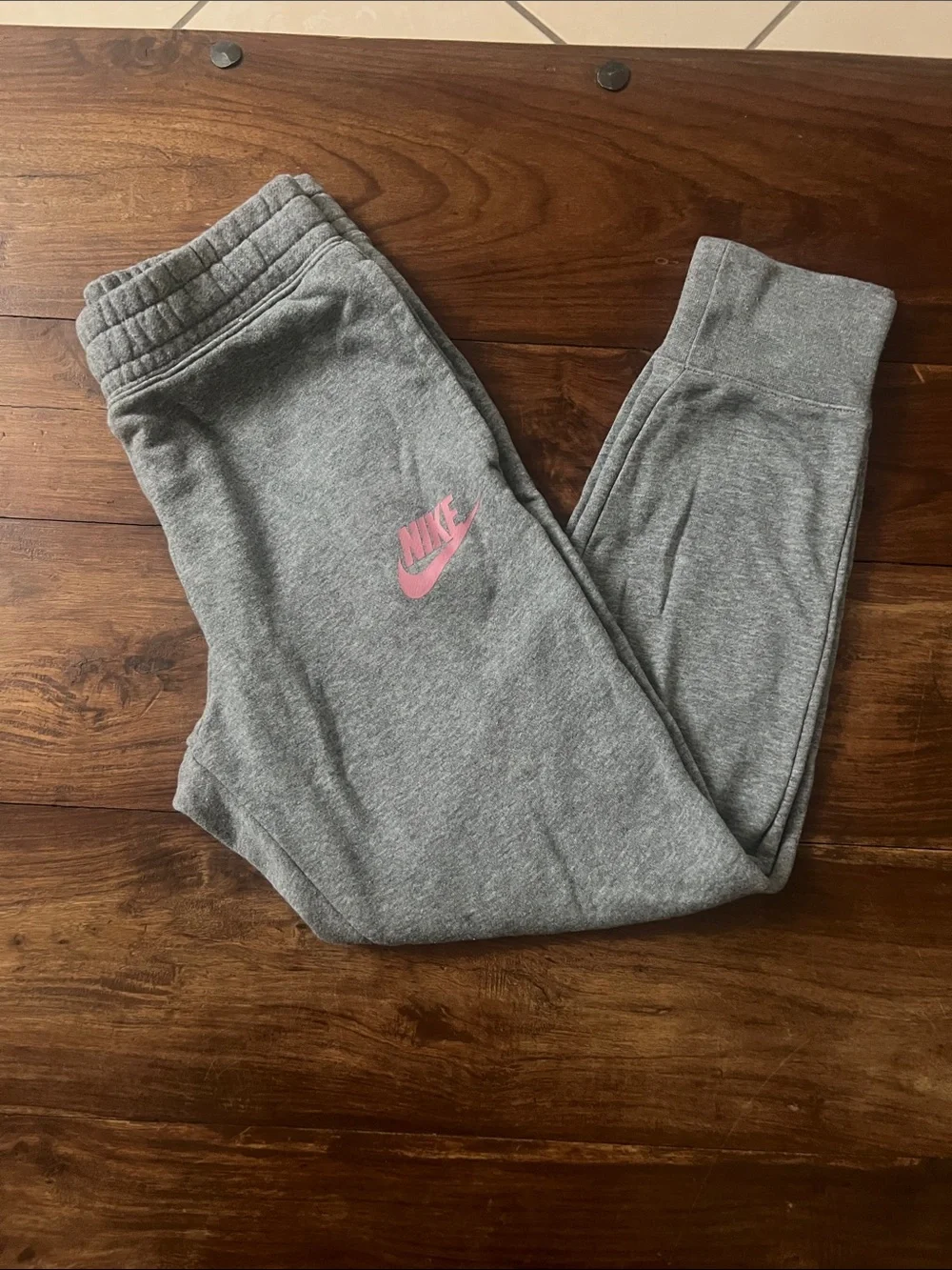 Nike Gray girl’s Sweatpants with Pink Swoosh